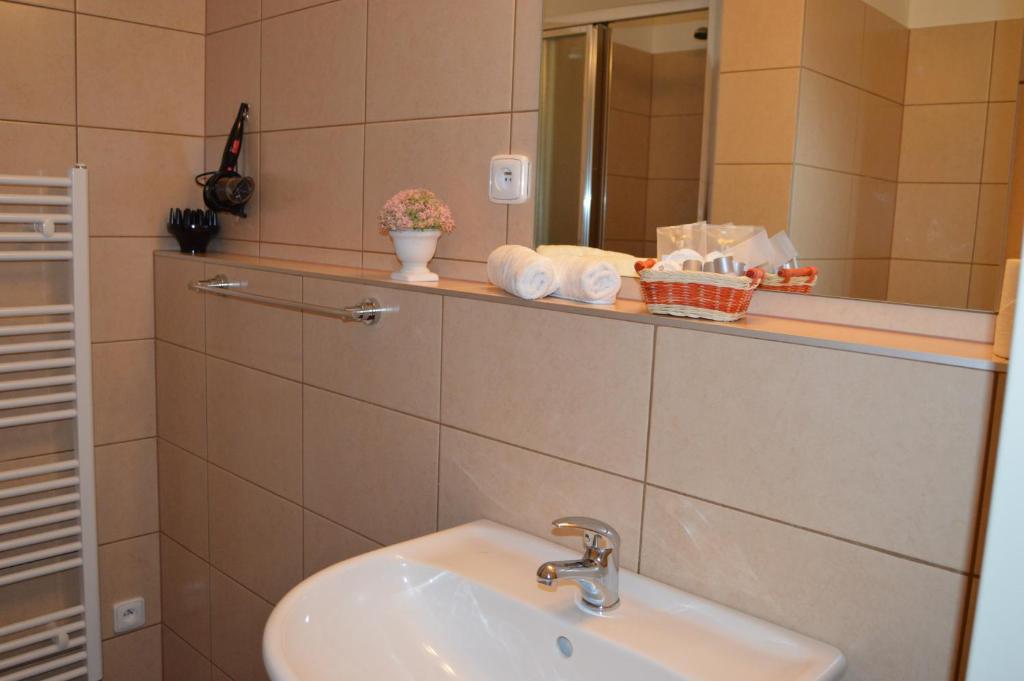 Koupelna v ubytování HOTEL ARÉNA