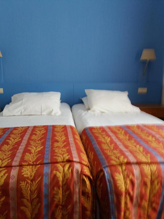 Postel nebo postele na pokoji v ubytování Hotel 'T Hert