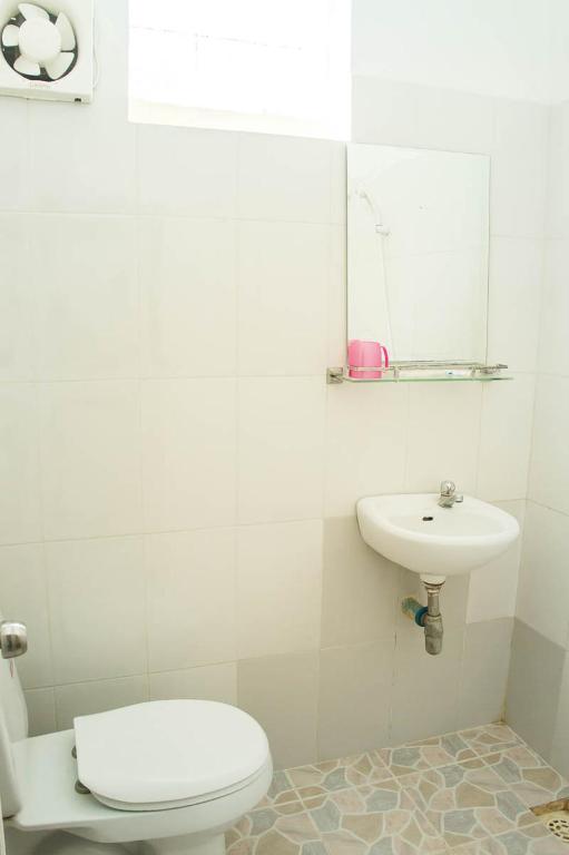 Koupelna v ubytování Visal Sak Guesthouse