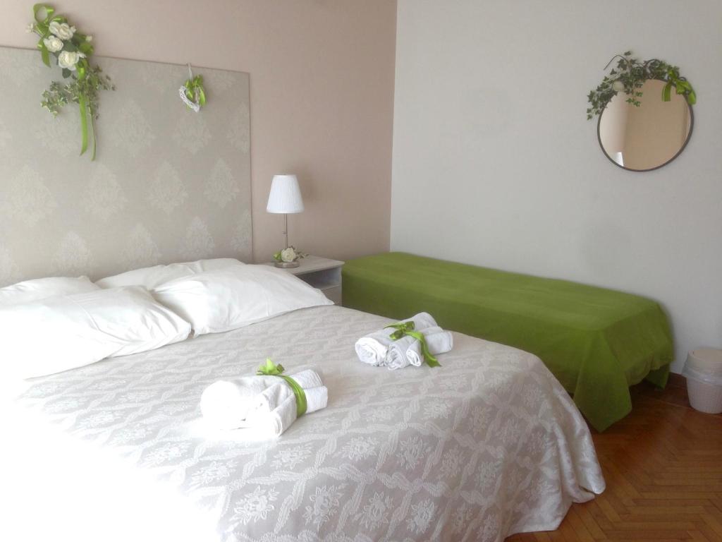 Postel nebo postele na pokoji v ubytování B&B Abano Garden