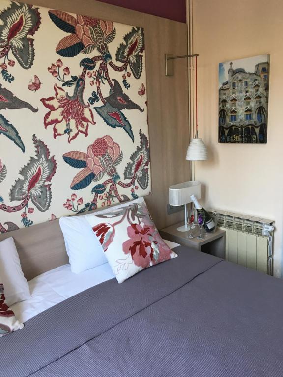 Posteľ alebo postele v izbe v ubytovaní Hotel Ginebra