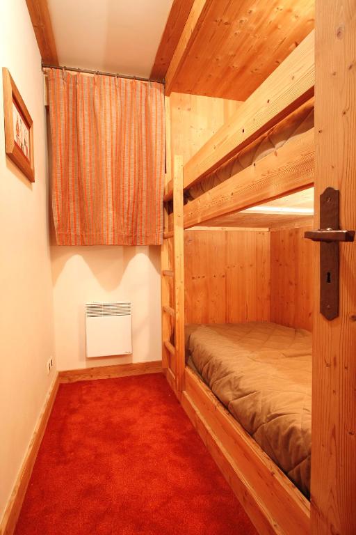 Postel nebo postele na pokoji v ubytování Vacanceole - Résidence Goléon -Val Ecrins