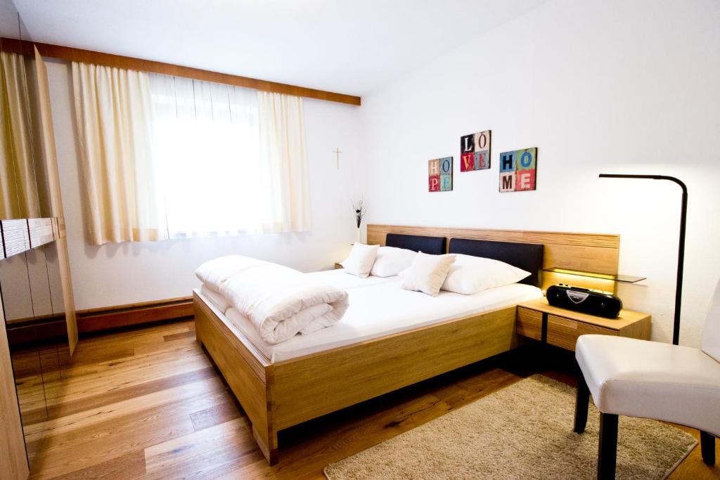 A bed or beds in a room at Haus Vlcek