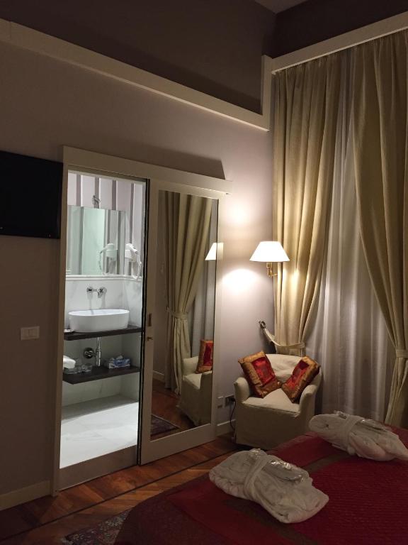 Postel nebo postele na pokoji v ubytování Grand Hotel Tettuccio