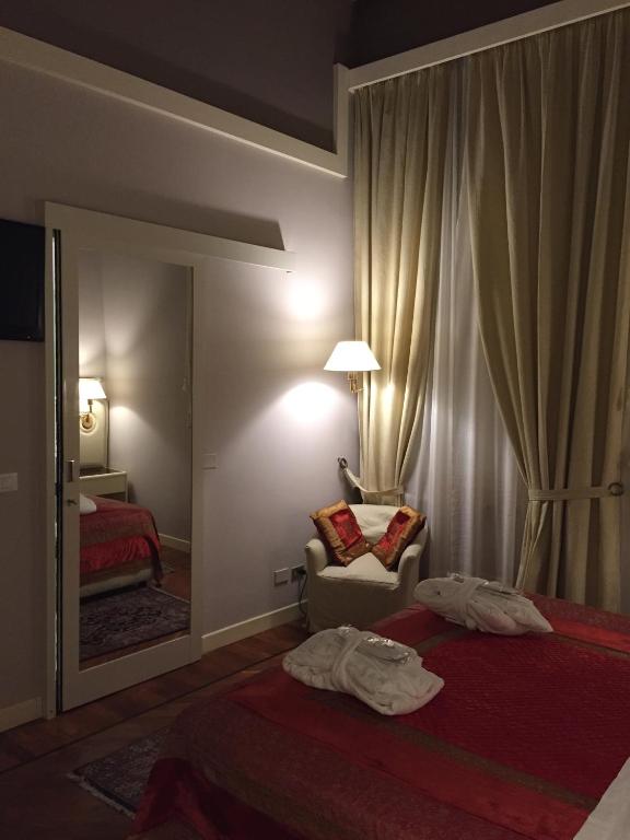 Postel nebo postele na pokoji v ubytování Grand Hotel Tettuccio