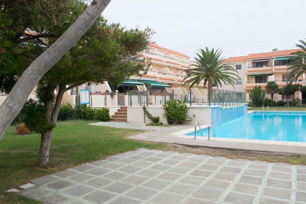 Bazén v ubytování Los Cancajos Apartamento Acijoa nebo v jeho okolí
