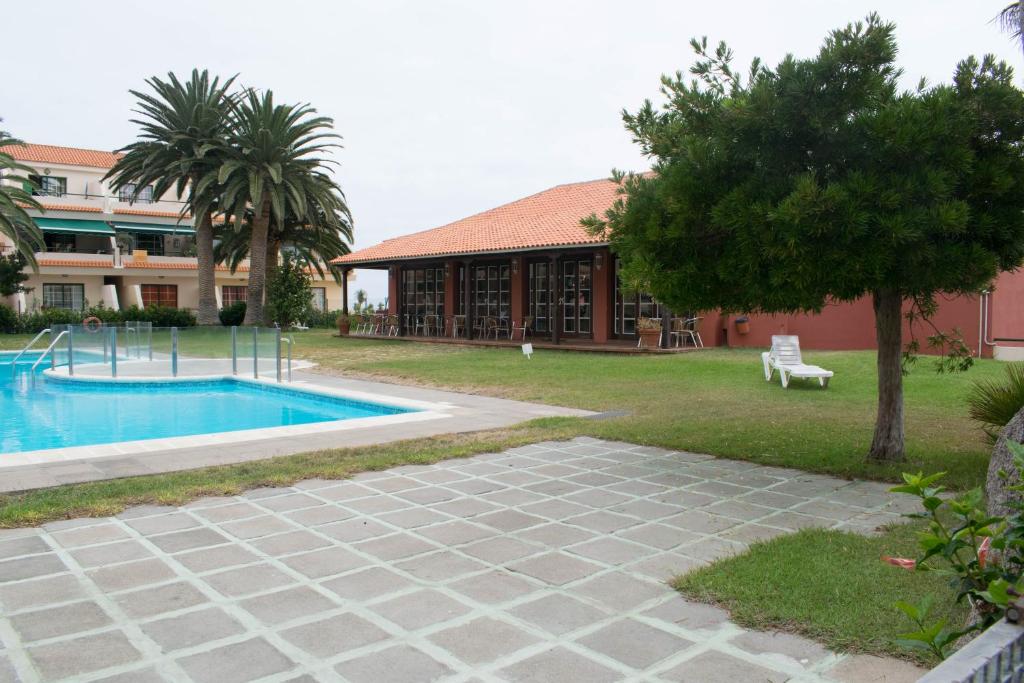 Bazén v ubytování Los Cancajos Apartamento Acijoa nebo v jeho okolí