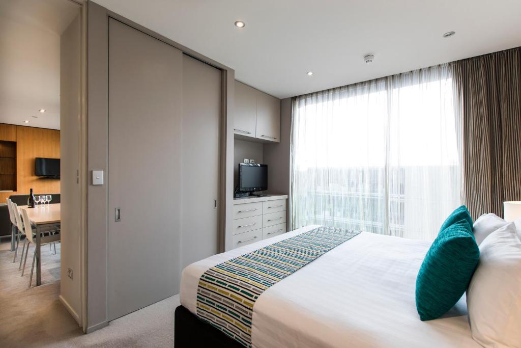 Voodi või voodid majutusasutuse Quest Carlaw Park Serviced Apartments toas