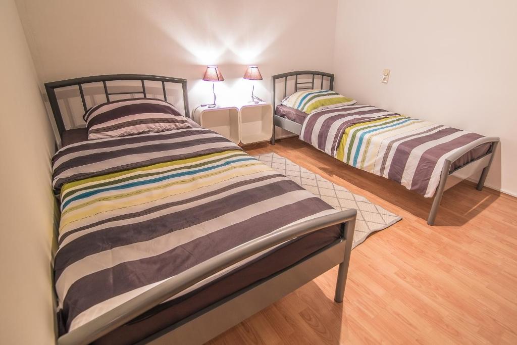 Postel nebo postele na pokoji v ubytování Apartment Marina
