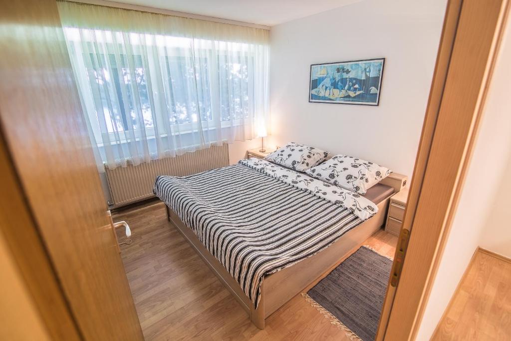 Postel nebo postele na pokoji v ubytování Apartment Marina