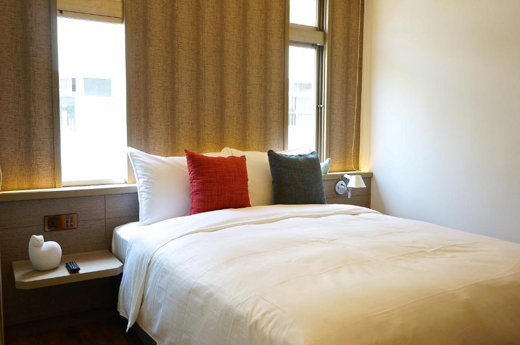 Postel nebo postele na pokoji v ubytování EG Hostel
