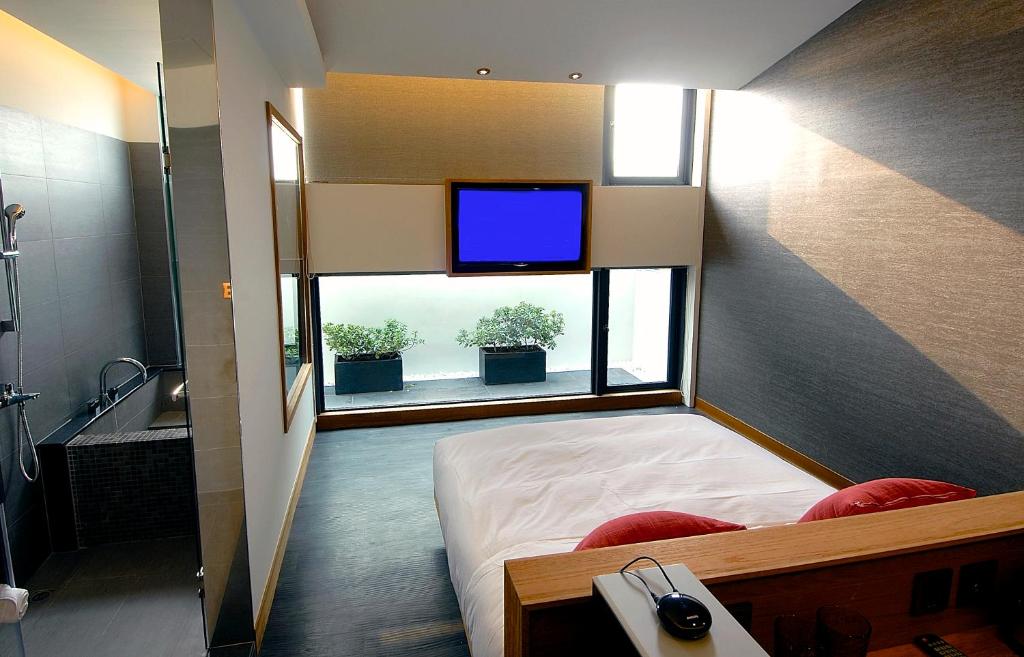 Postel nebo postele na pokoji v ubytování EG Hostel