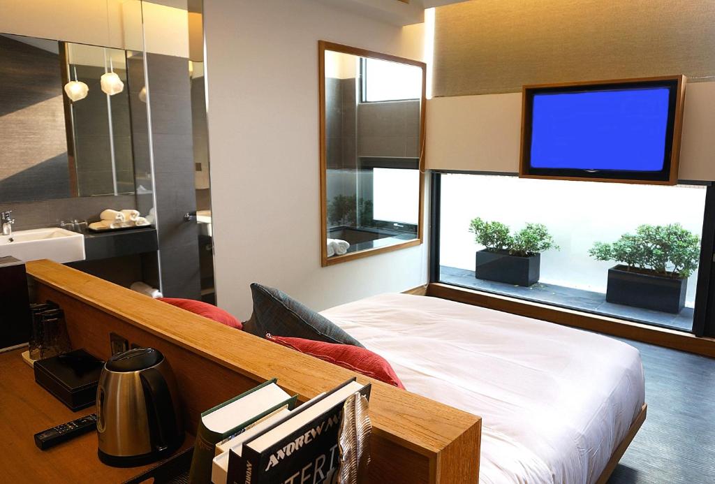 TV a/nebo společenská místnost v ubytování EG Hostel