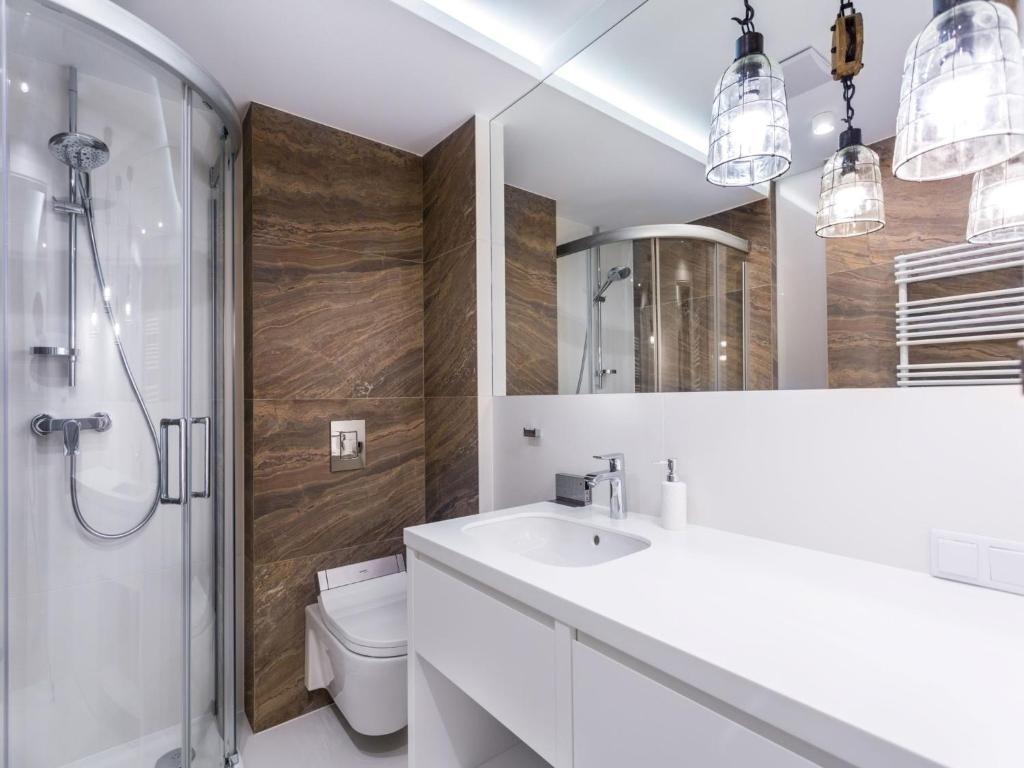 Kúpeľňa v ubytovaní TatryTop Apartamenty Szymaszkowa Ski Premium