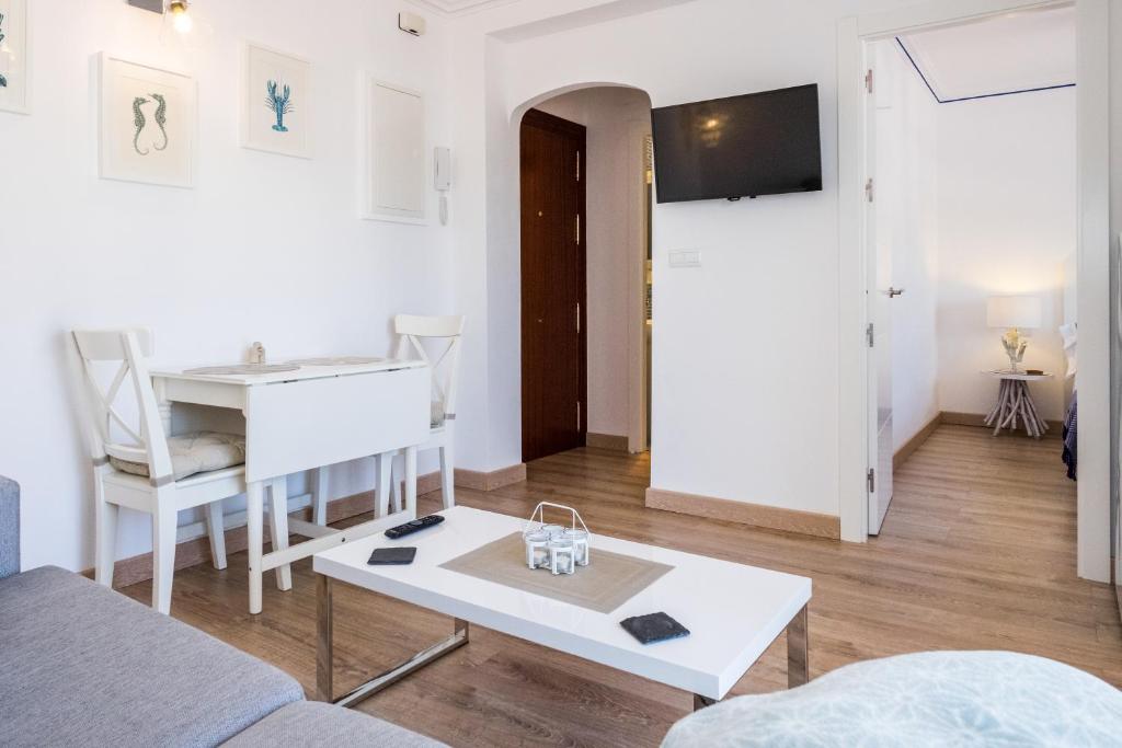 Televízia a/alebo spoločenská miestnosť v ubytovaní Bijou apartment in Bella Vista