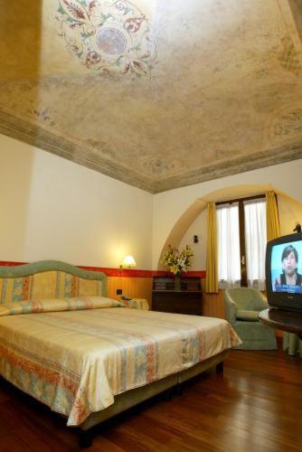 Postel nebo postele na pokoji v ubytování Hotel Due Mondi