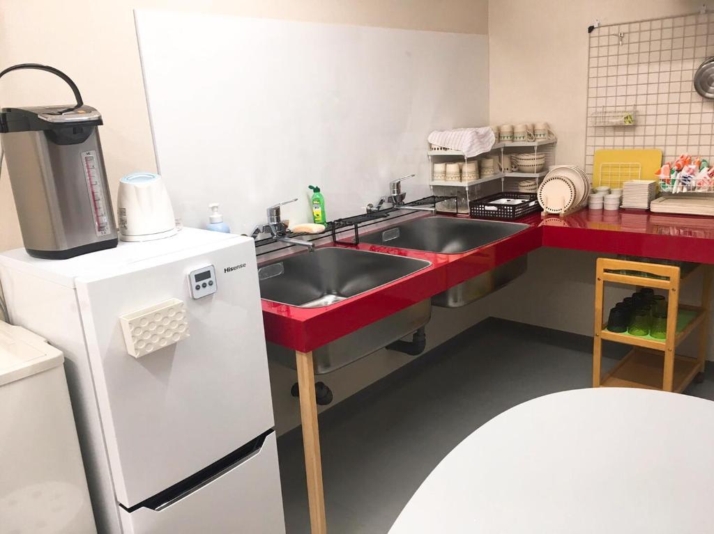 Kuchyň nebo kuchyňský kout v ubytování Hostel Mallika