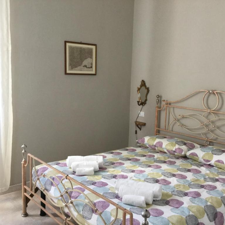 Postel nebo postele na pokoji v ubytování B&b note di mare