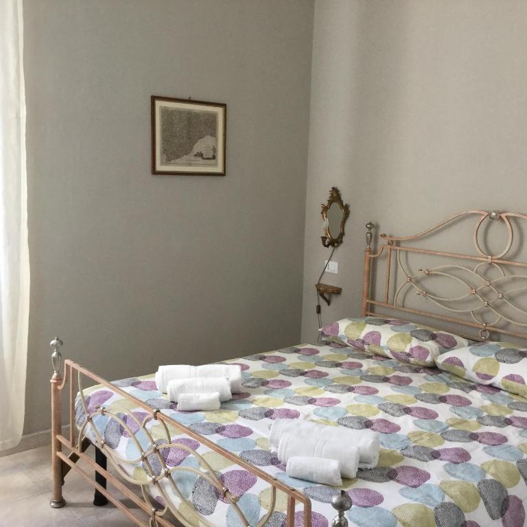 Postel nebo postele na pokoji v ubytování B&b note di mare