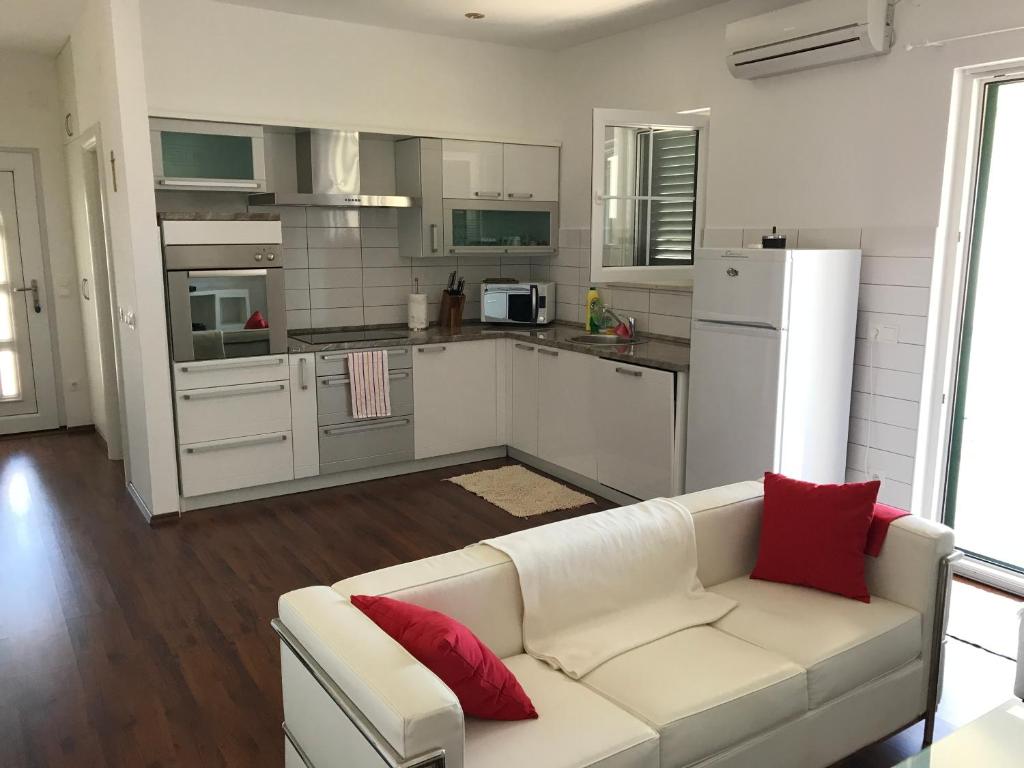 Kuchyň nebo kuchyňský kout v ubytování Apartment Olic