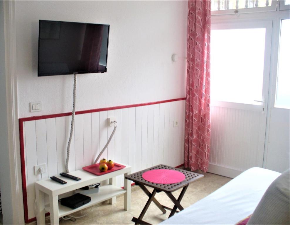 TV a/nebo společenská místnost v ubytování Casa Maria