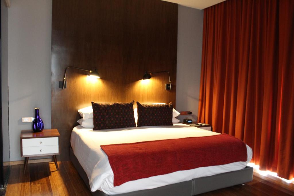 Postel nebo postele na pokoji v ubytování Hotel Love It CAS Consulado