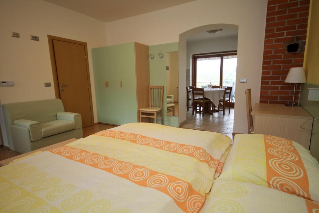 Postel nebo postele na pokoji v ubytování Zoi Apartments