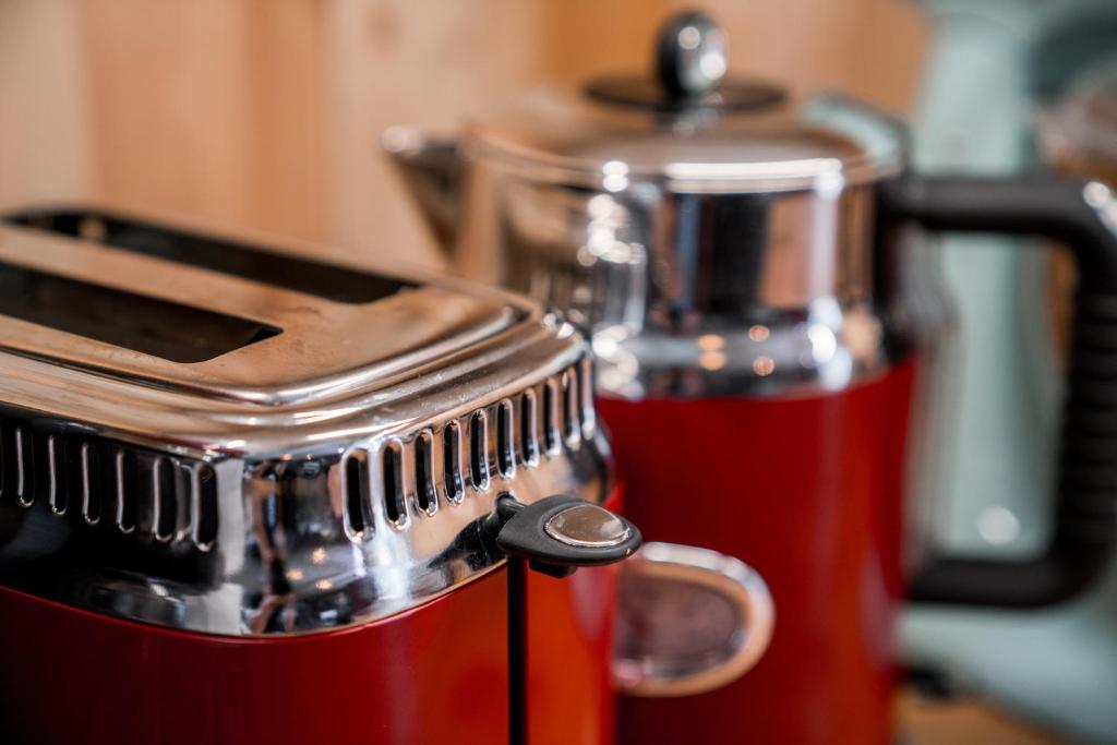 a close up of a toaster and a coffee maker at Tangs in Ísafjörður