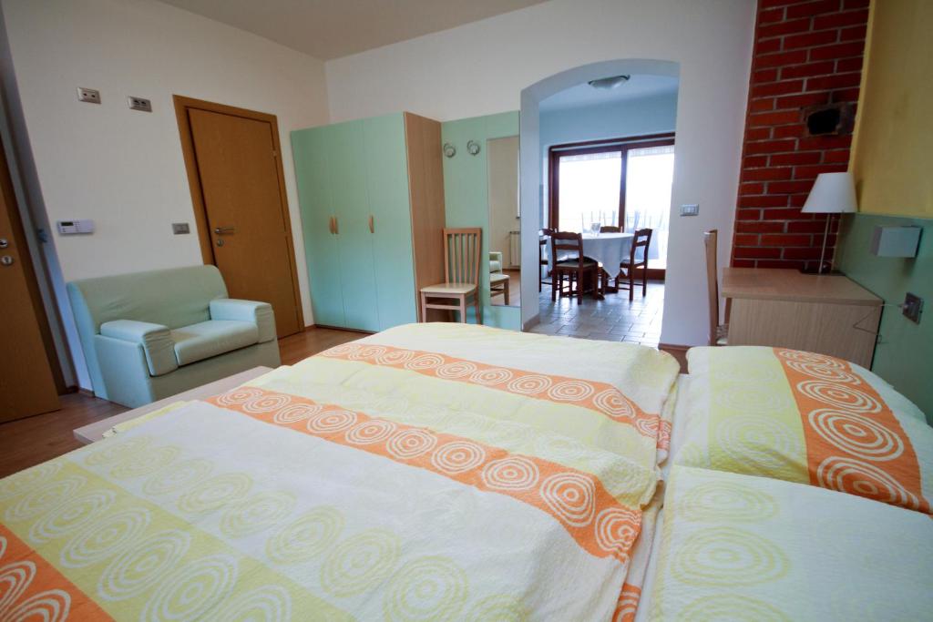 Postel nebo postele na pokoji v ubytování Zoi Apartments