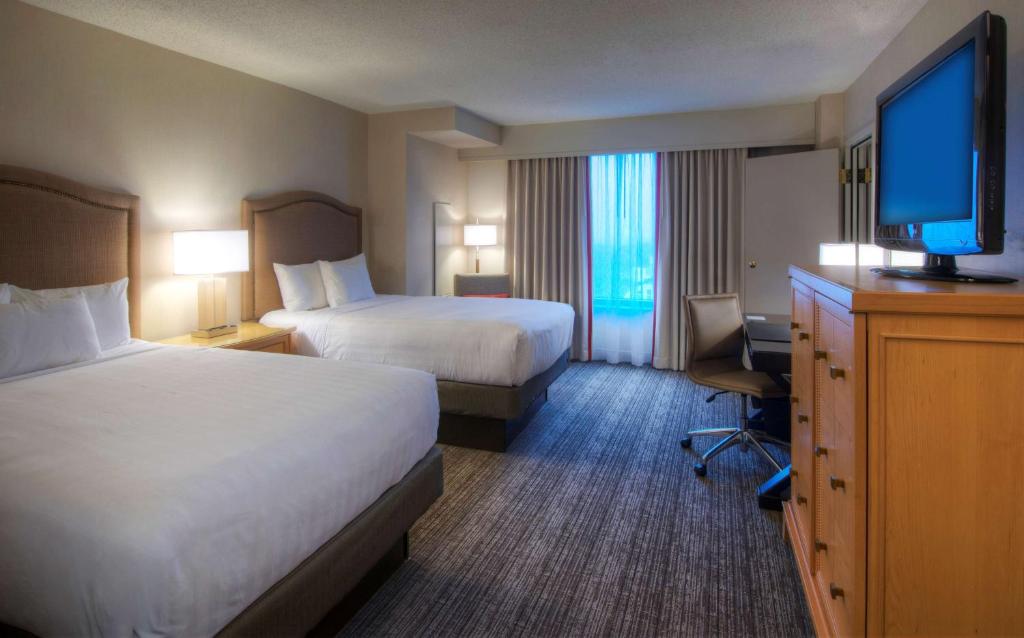 Postel nebo postele na pokoji v ubytování Hyatt Regency Reston