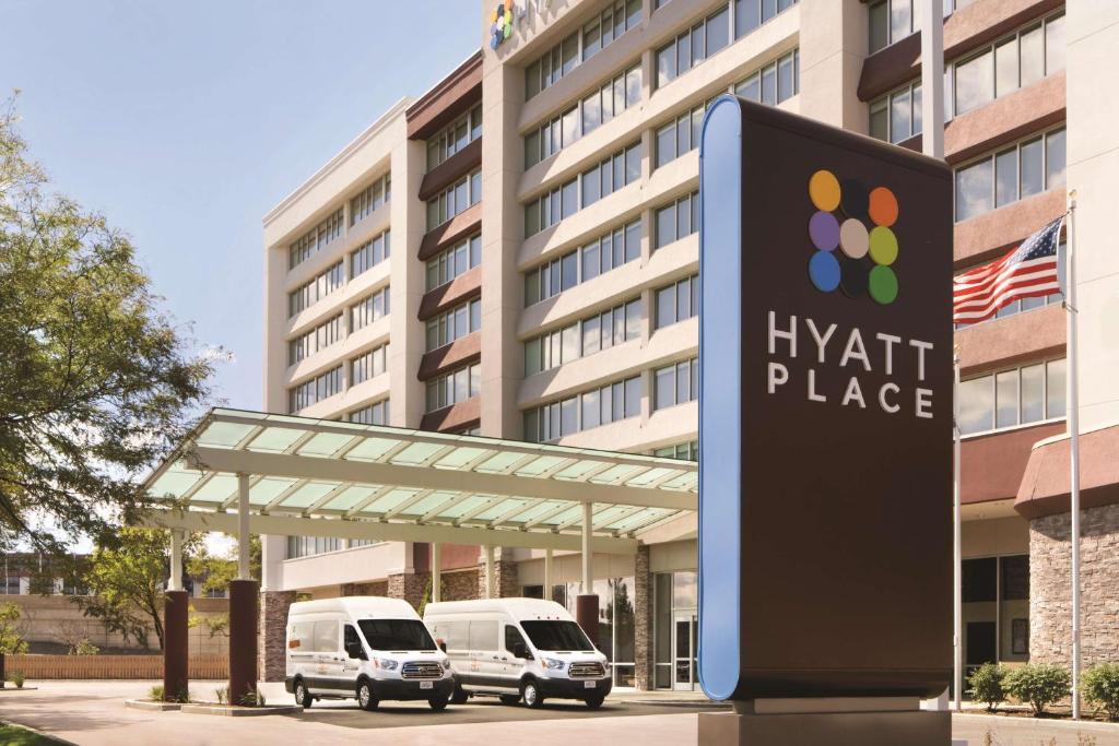 a hyatt place sign in front of a building at Hyatt Place Chicago O'Hare Airport in Rosemont