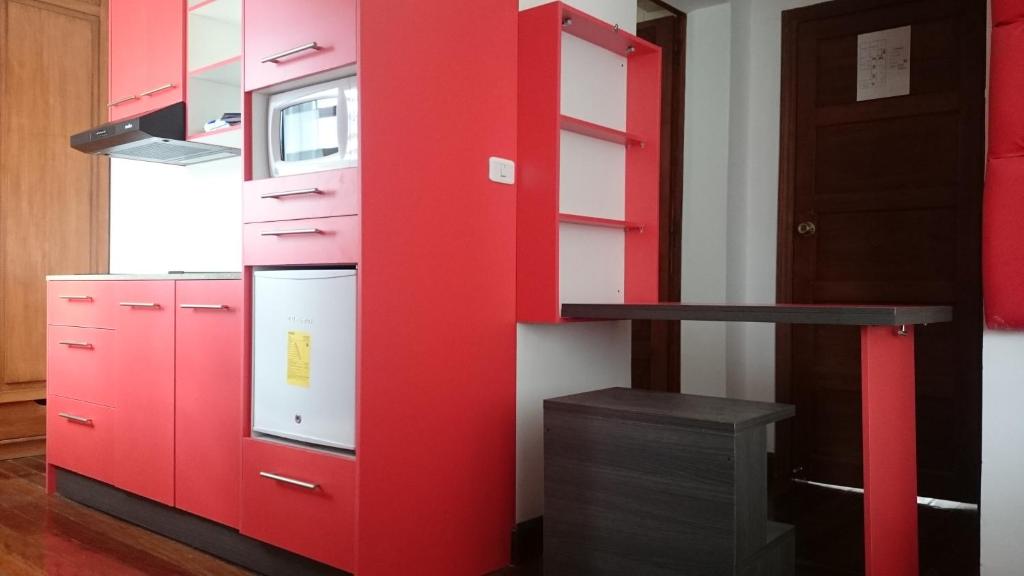 Kuchyň nebo kuchyňský kout v ubytování Hotel + Arte