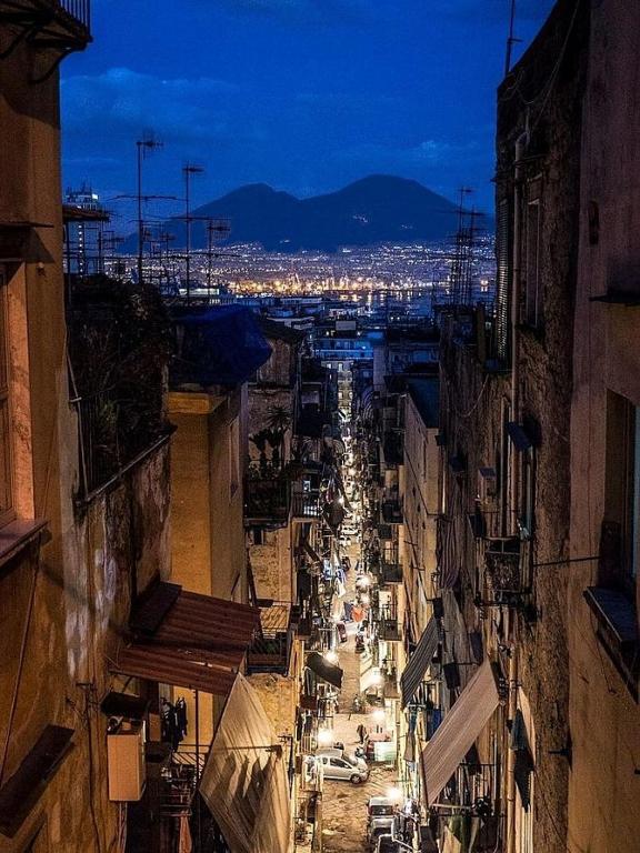 an overhead view of a busy city street at night at Relais Borbonico in Naples