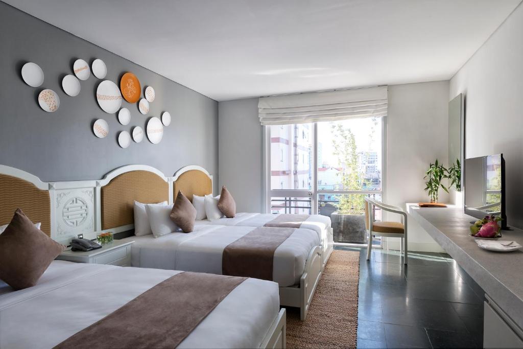 Postel nebo postele na pokoji v ubytování Alba Spa Hotel