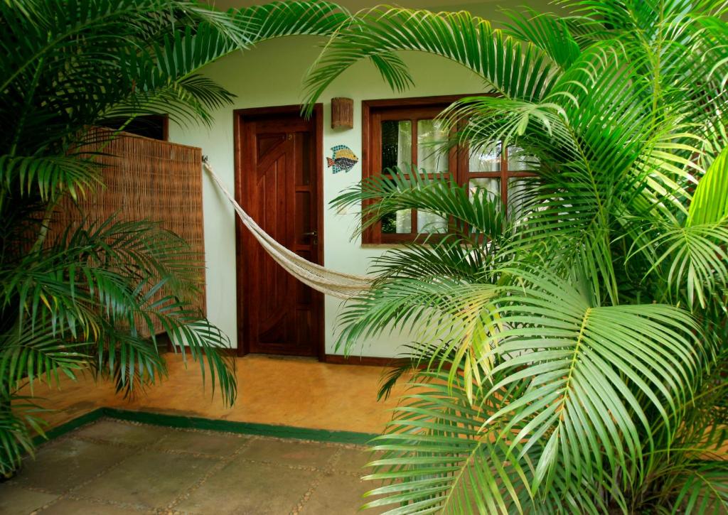 Aed väljaspool majutusasutust Vila dos Passaros Flats