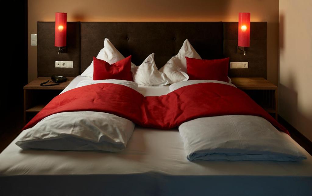 Postel nebo postele na pokoji v ubytování Hotel Gantkofel