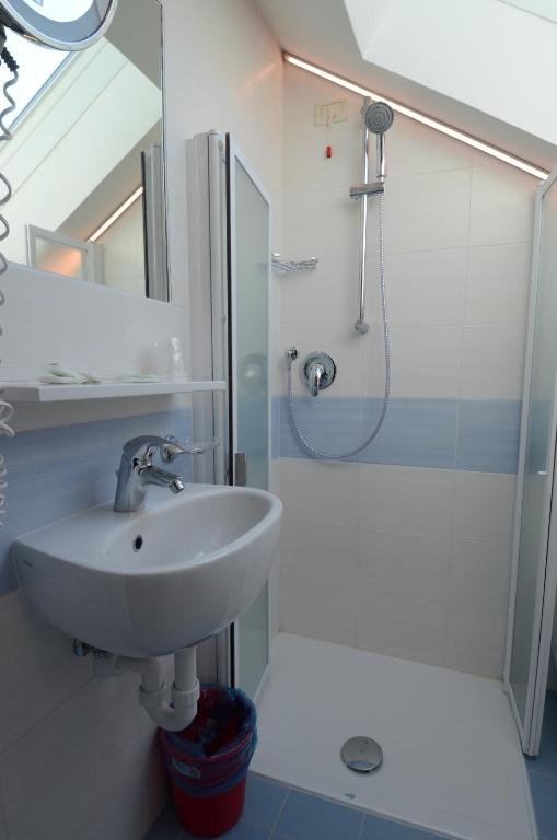 Koupelna v ubytování Hotel Mimosa