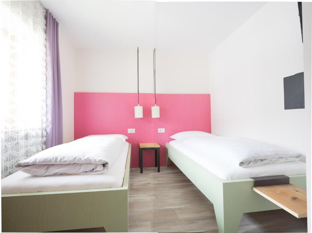 Postel nebo postele na pokoji v ubytování Residence Vis à Vis