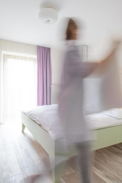Postel nebo postele na pokoji v ubytování Residence Vis à Vis