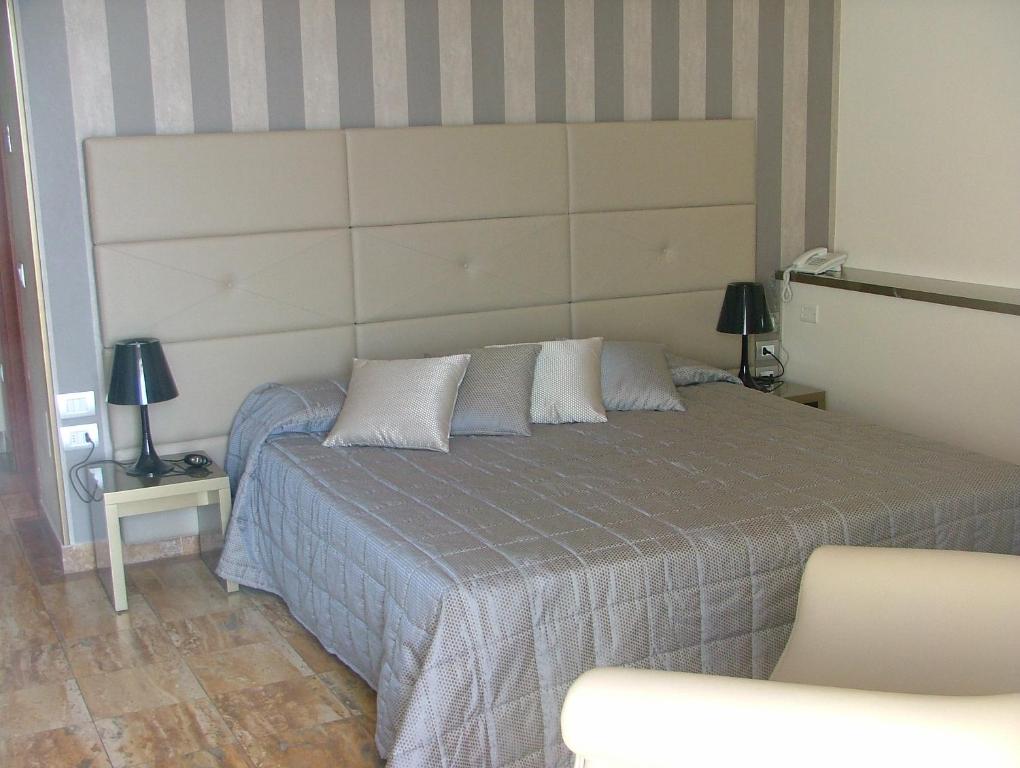 Cama o camas de una habitación en Hotel Sabbia D'oro