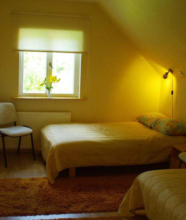Postel nebo postele na pokoji v ubytování Vanasauna Guesthouse