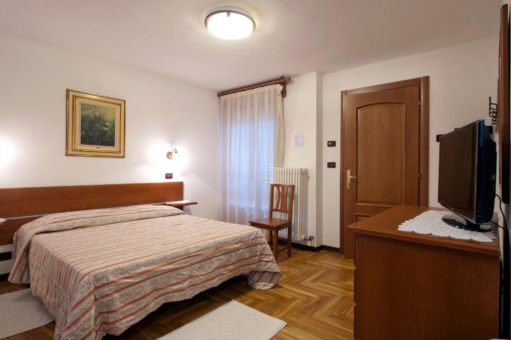 Postel nebo postele na pokoji v ubytování Albergo Castello da Bonino