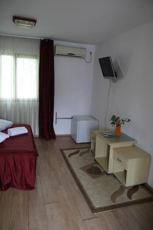 Postel nebo postele na pokoji v ubytování Hotel Doi Taurasi