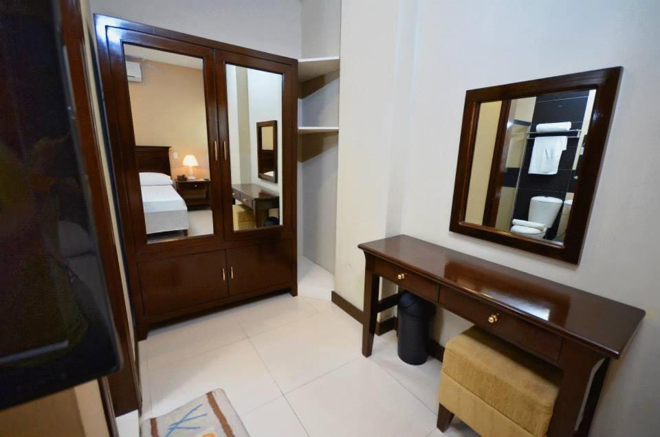 Postel nebo postele na pokoji v ubytování Hotel Formosa Daet