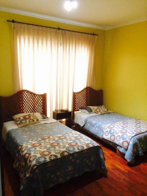 Postel nebo postele na pokoji v ubytování Apart Hotel Uman