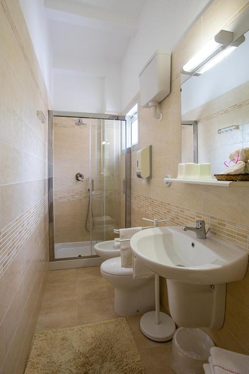 Koupelna v ubytování Hotel Lido