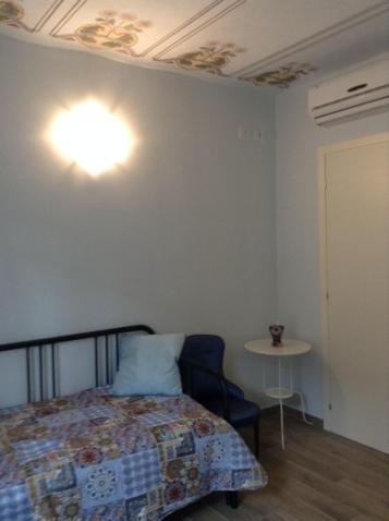 A bed or beds in a room at El Doorado