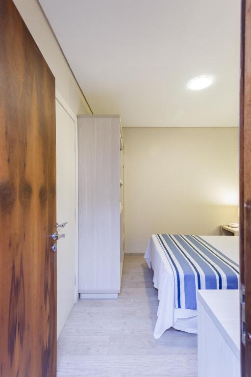 Postel nebo postele na pokoji v ubytování Hotel Sol By MRHotelaria