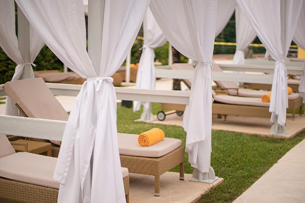 Posezení v ubytování JOIA Paraíso by Iberostar