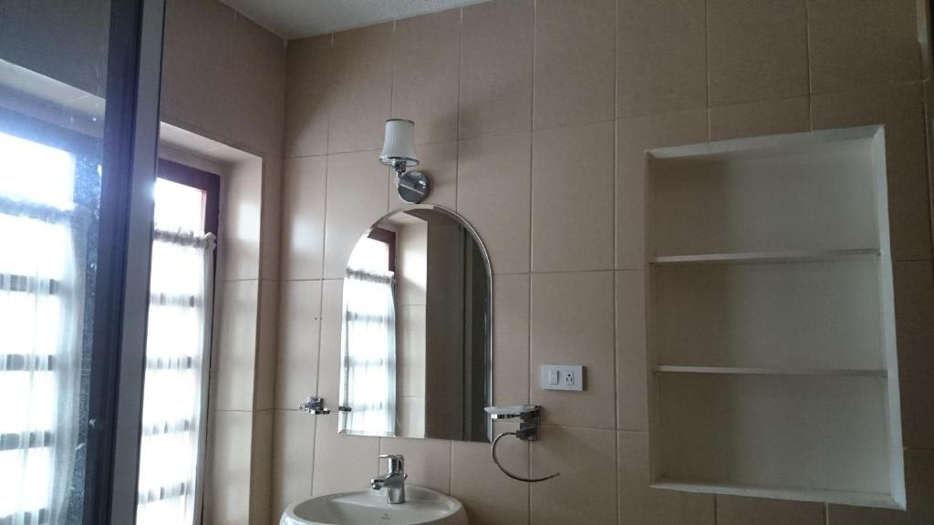 Koupelna v ubytování Hotel + Arte